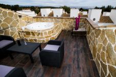 Casa adosada en Salou - Nature Plus 2. Adosado con barbacoa, jacuzzi y piscina comunitaria.